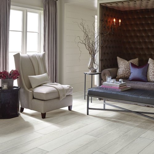 Elegant living room with wood-look luxury vinyl flooring from Brosious Carpet and Floors Inc in Missoula, MT
