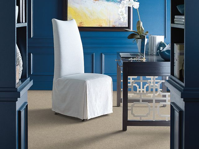 Home office with blue walls and a white chair from Brosious Carpet and Floors Inc in Missoula, MT